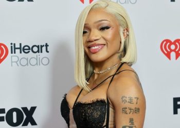 GloRilla’s Shimmery Dress in iHeartRadio Photos Is All About Strings