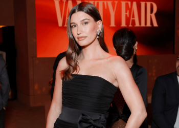 Photos: Hailey Bieber Serves Leading Lady Vibes In Strapless Dress For Rhode Launch Party