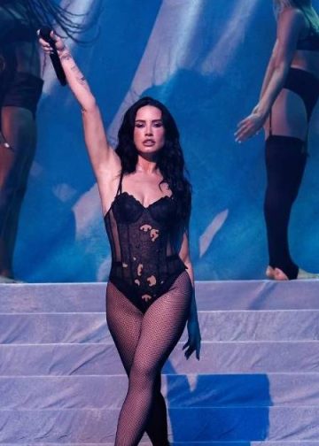 Demi Lovato Turns Heads With Striking Fishnet Ensemble