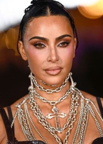 Kim Kardashian Wows Fans in Sheer Corset Outfit