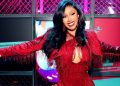 Cardi B Is Holiday Season Ready in Red Micro Shorts in ANUA Ad