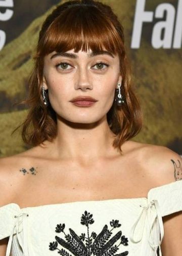 Ella Purnell Flaunts Her Tattoos in Dolce & Gabbana Minidress