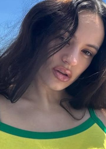 Dua Lipa’s Sister Rina Wows in Striped Mini-Shorts