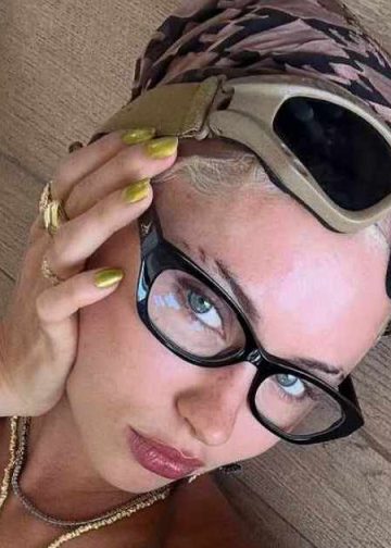 Iris Law’s Tiny Bikini Photo Shows Her Lounging on a Tree