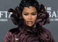 Teyana Taylor’s Face Nearly Hidden by Burberry Collar at BAFTAs 2026