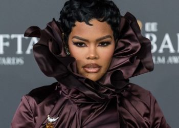Teyana Taylor’s Face Nearly Hidden by Burberry Collar at BAFTAs 2026