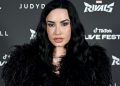 Demi Lovato ‘Warms up for Tour’ in See-Through Lace Corset Bodysuit