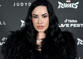 Demi Lovato ‘Warms up for Tour’ in See-Through Lace Corset Bodysuit
