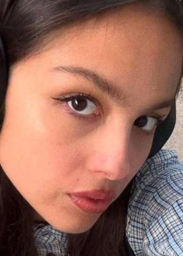 Olivia Rodrigo Layers an Open Jacket Over a Tie-Up Bikini Top for British Vogue