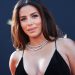 Eva Longoria’s Daring Neckline Dress Shines During Eddie Murphy’s Win