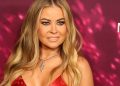 Carmen Electra’s Bikini & Fishnet Shrug Do Little To Cover Her Curves