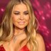 Carmen Electra’s Bikini & Fishnet Shrug Do Little To Cover Her Curves