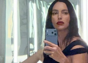 Irina Shayk Leaves Her Top Unbuttoned for Ultra-Plunging Look