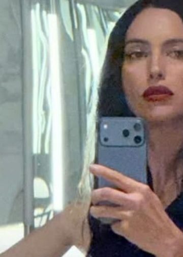 Irina Shayk Leaves Her Top Unbuttoned for Ultra-Plunging Look