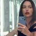 Irina Shayk Leaves Her Top Unbuttoned for Ultra-Plunging Look