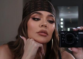 Khloe Kardashian Stuns in Wet See-Through Dress for Sultry XO Blue Shoot