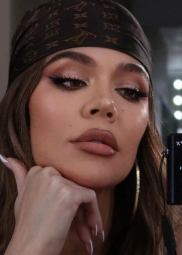 Khloe Kardashian Stuns in Wet See-Through Dress for Sultry XO Blue Shoot