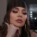Khloe Kardashian Stuns in Wet See-Through Dress for Sultry XO Blue Shoot