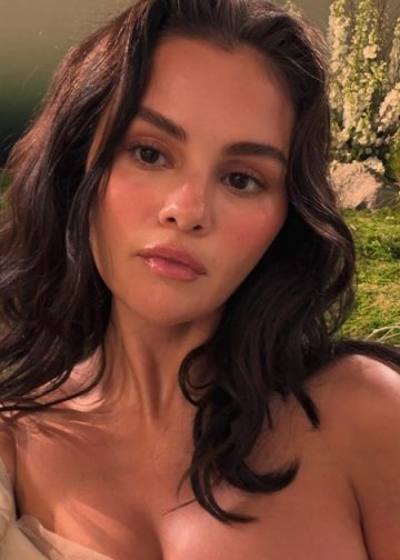 Selena Gomez Applies Rare Beauty Lip Color in Fully See-Through Dress