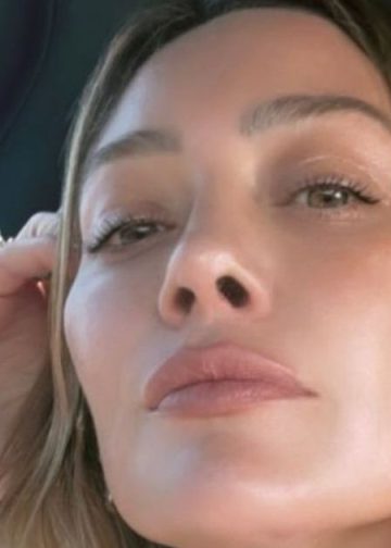 Hilary Duff’s High-Cut Swimsuit Puts Her Curves Front & Center