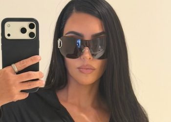 Kim Kardashian Doubles up on Bikinis & Leaves Plenty Exposed